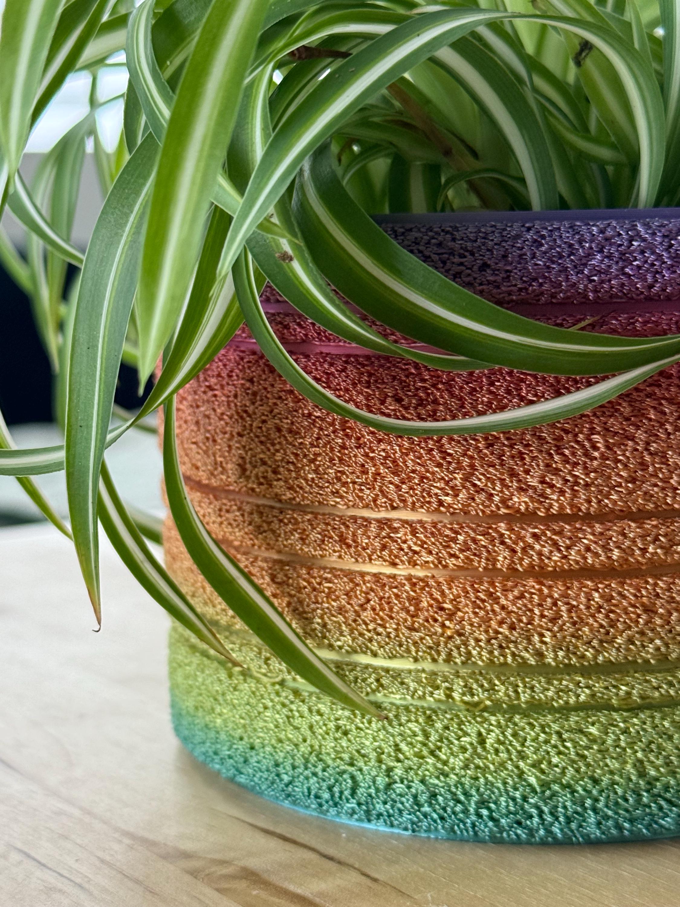 Detail of the fuzzy rainbow gradient texture on a 3D printed planter